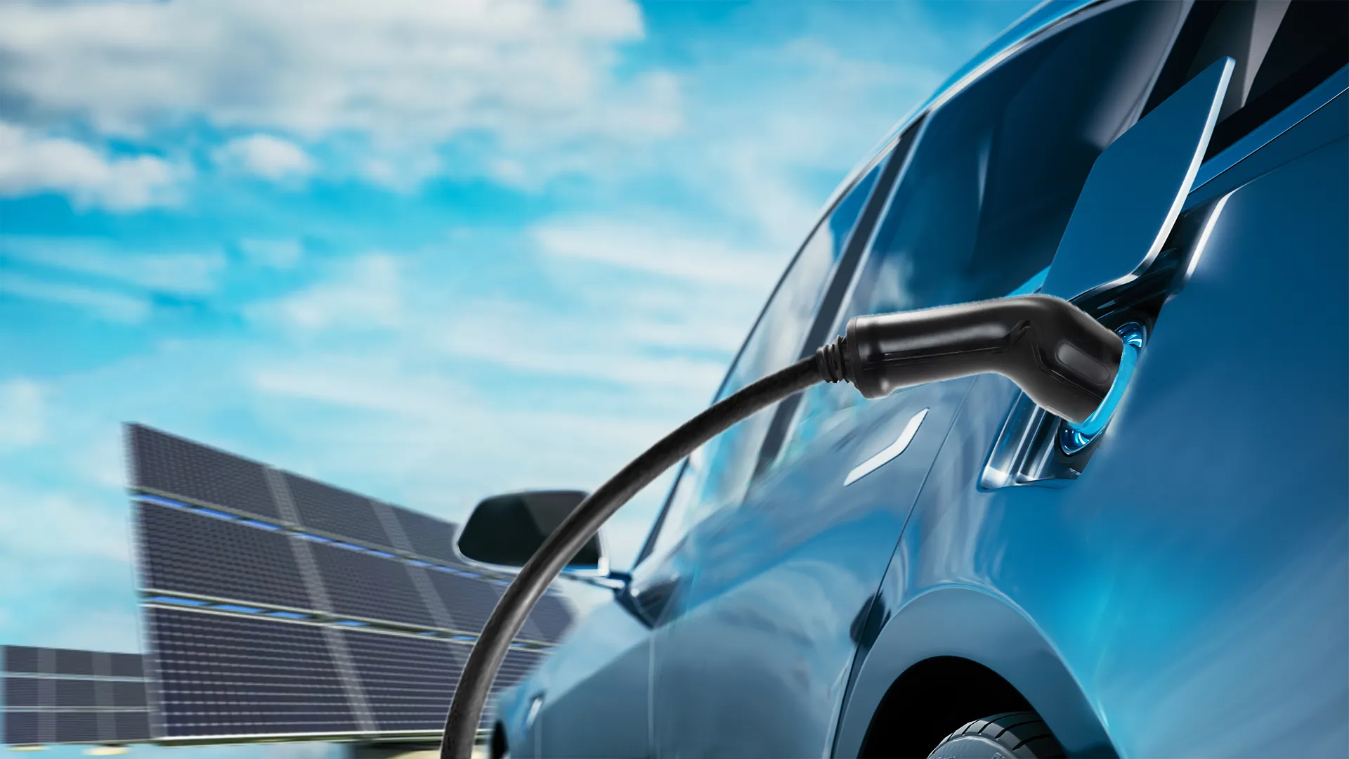 Electric vehicle connected to a charging cable.